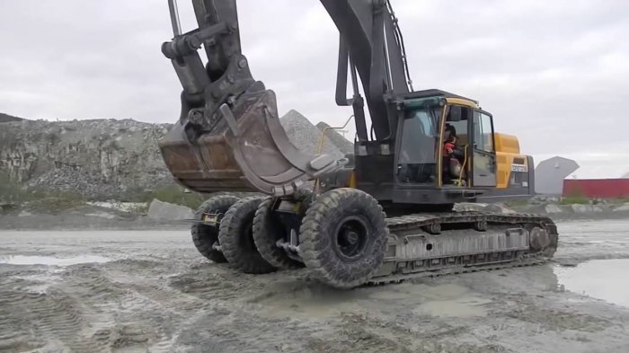 Как переобувают экскаваторы!?